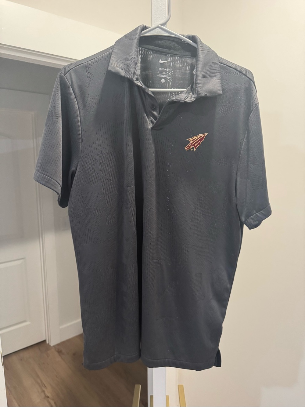 Nike Men’s Dark Gray Polo with Red Accent Logo